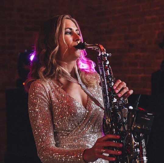 Saxophonist silver dress
