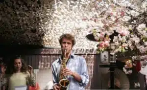 Flower background saxophonist