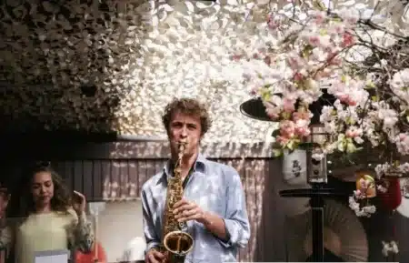 Flower background saxophonist
