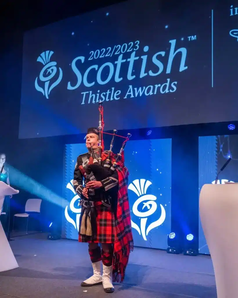 bagpiper performing at awards